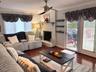 With fireplace and access to deck