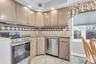 Granite Counter, Tiled Back Splash