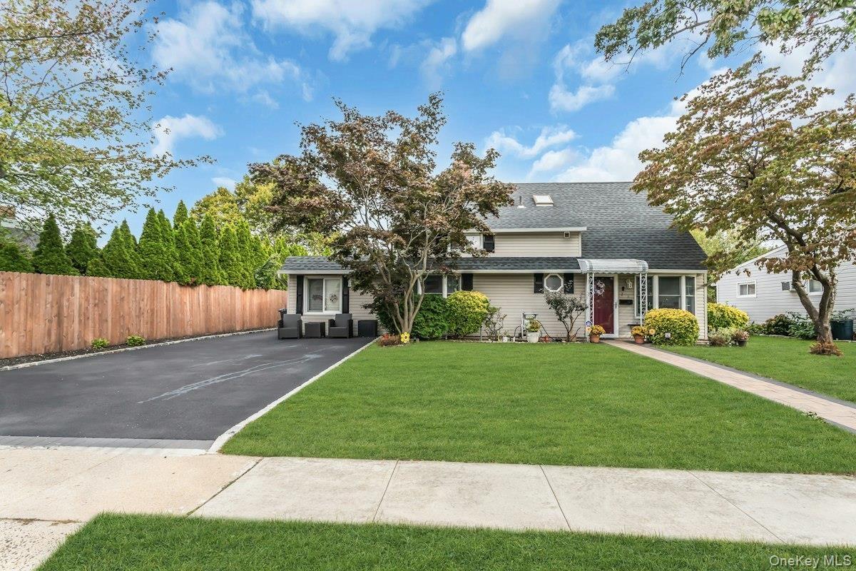 Double Wide Asphalt Driveway with Cobblestone Border
