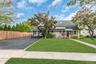 Double Wide Asphalt Driveway with Cobblestone Border