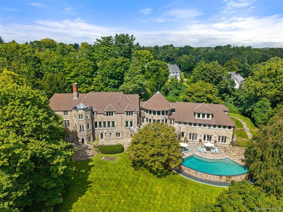 Welcome to Four Winds an incredible renovated estate set on 3 acres