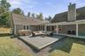 back yard deck with hot tub and lounge area