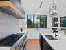 Kitchen range with stone backsplash