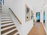 Staircase with wood handrail