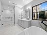 Primary bathroom with glass shower