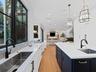 Kitchen sink view across the island
