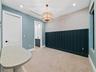 Upstairs loft with blue wainscoting