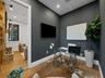 Private office with dark accent wall