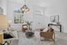 Enter into the home and the views overlooking the pool and lake are so peaceful