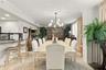 Dining Room features elegant tile and dining table seating 8