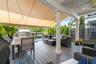 retractable awning spanning the whole patio