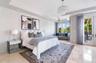 with French doors opening onto the balcony