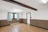 Wood-finish flooring, exposed ceiling beam and garage access