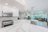 Lots of counter space with beautiful toe kick lighting and modern remote-controlled lighting