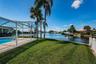 Big side yard for pets. Pool door leads outside