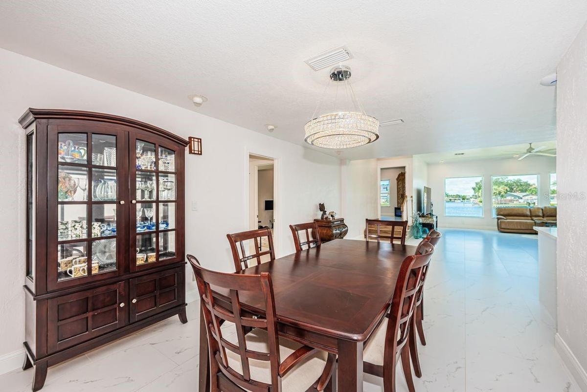 Dining opens up to expansive living space