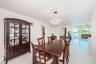 Dining opens up to expansive living space