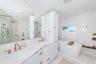Deep bath tub and dual sinks
