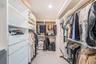 Primary custom walk-in closet