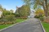 Privately Situated Park-like Setting, Full Yard Accent Lighting & Sprinkler Irrigation