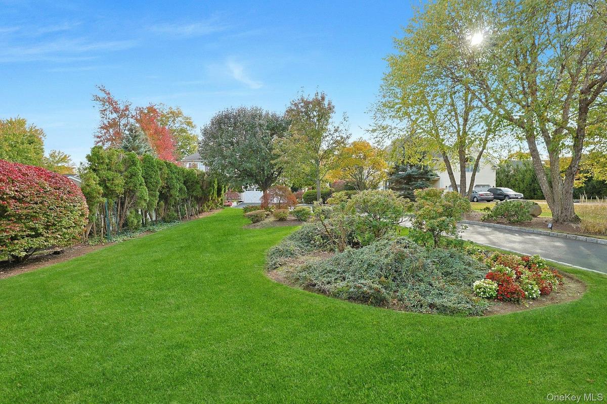 Beautifully Landscaped Park-like Setting, Full Yard Accent Lighting & Sprinkler Irrigation