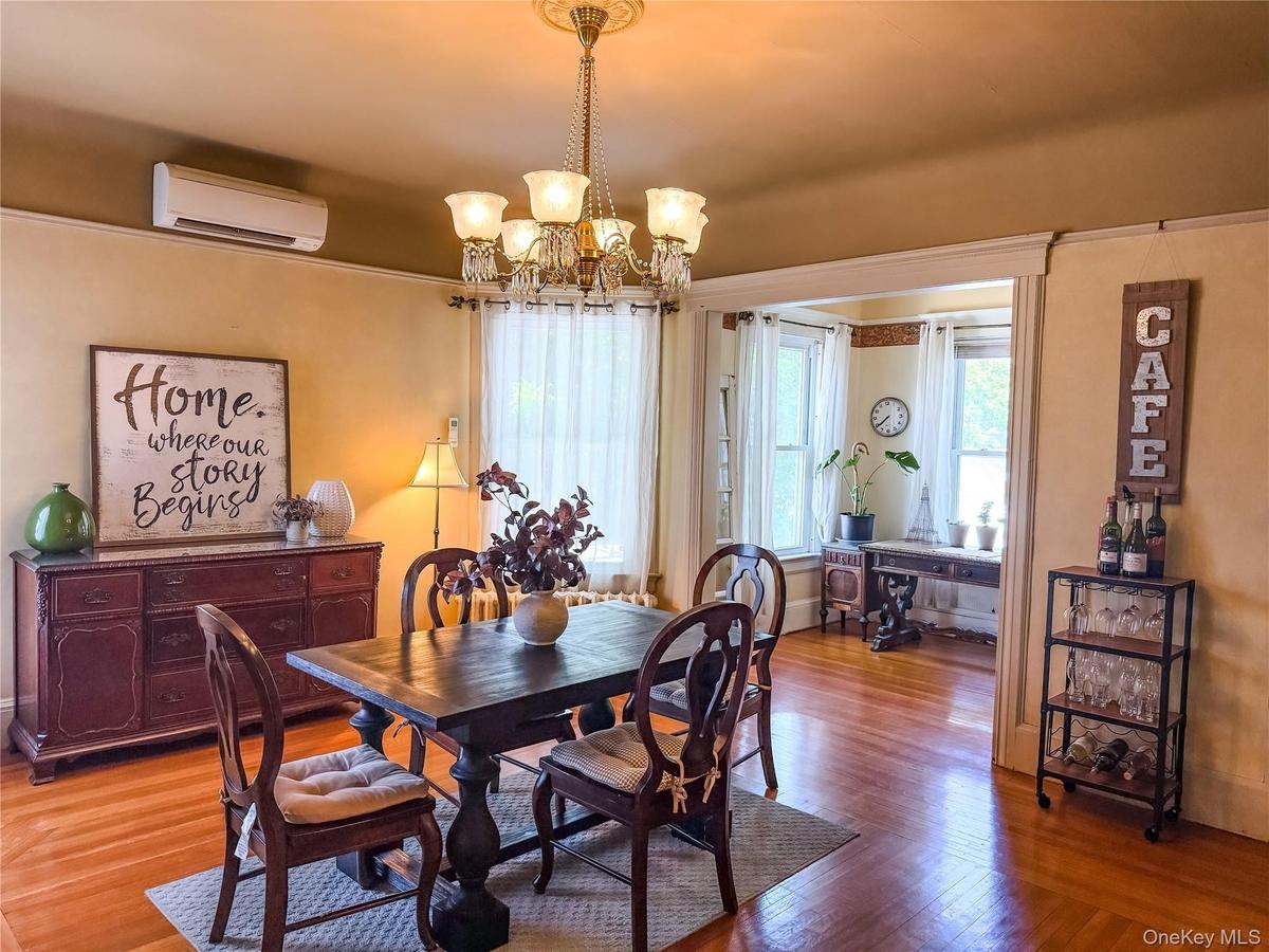 Main House Dining Room Hardwood flooring and decorative ceiling medallion