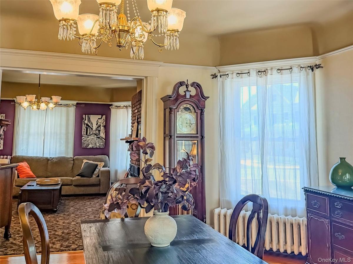 Main House Dining Room with Ornate chandelier with crystal accents
