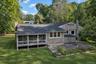 Owner Apartment rear of home with screened in porch and private patio and yard.   Central Air and whole house generator.