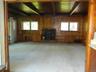 With pellet stove, built ins and wonderful windows