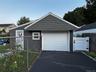 4 car Driveway Leads to Newly Sided Garage w New Windows