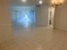 Huge Living Room with Slider to Wrap-Around Balcony
