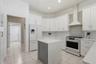 High ceilings with exceptional natural light, this fresh kitchen is a home run.