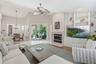 Large living room is central to the kitchen and dinette making it the anchor of the home.