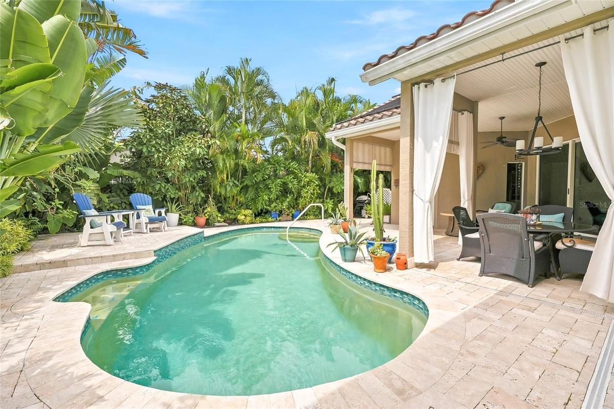 Solar-heated pool perfect for swimming laps or cooling off on the bench seat.