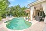 Solar-heated pool perfect for swimming laps or cooling off on the bench seat.