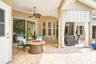Separate area for a firepit, or two areas for multiple patio tables.