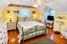 Wood-finish flooring with a ceiling fan