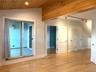 Large bedroom suite with closets and a cozy reading nook that overlooks the Armory.