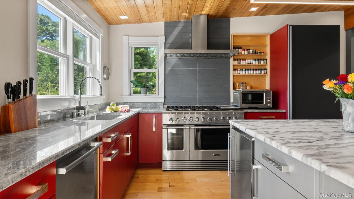 Stone counters, 6 burner gas stove with griddle.