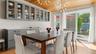 Built in custom cabinetry. Glass doors to the deck for outdoor door dining and entertaining.