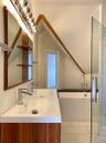 Top floor ensuite bath with tiled shower, double vanity and great soaking tub.  A second full bath on the first floor of the apartment.