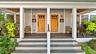 Primary residence on right side on three floors. Two bedroom two full bath apt on second and third floor, entrance on left.