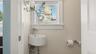 Adjacent half bath.