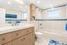 Primary bathroom with a tub/shower combination.