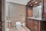 Custom cabinets, granite counters and big shower.