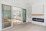 Three Season room with fireplace and TV hook ups with built in cabinets