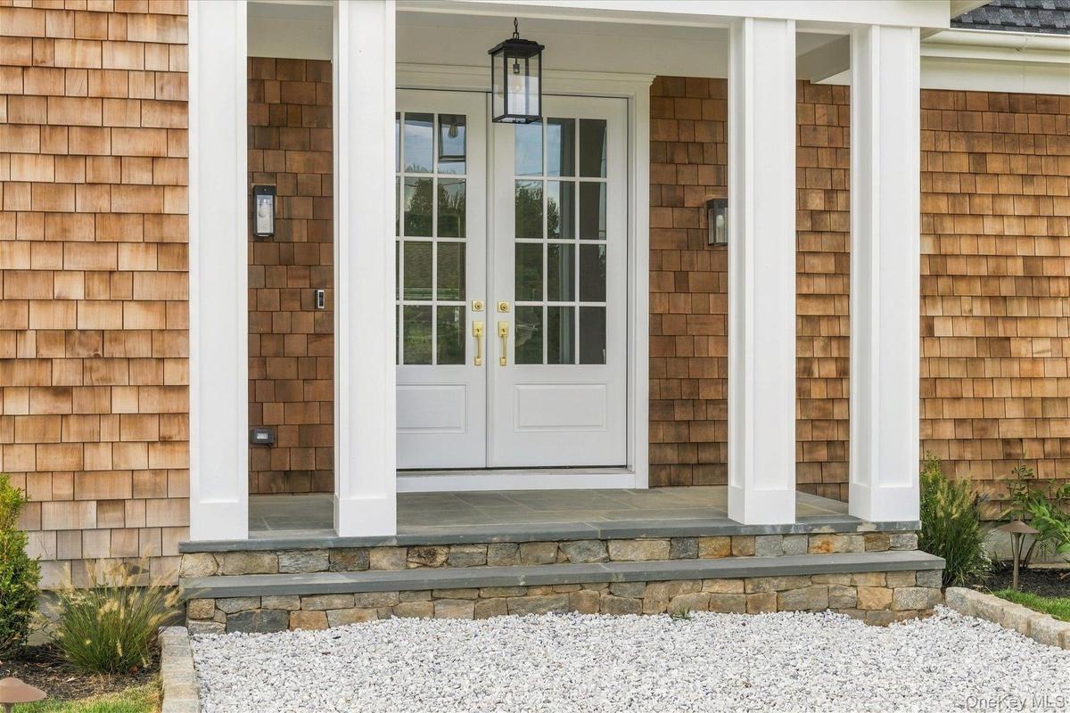Entrance way with covered porch.