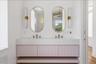 Second floor primary bathroom with custom double vanity.