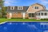 In ground heated salt water pool by efficient heat pump system.
