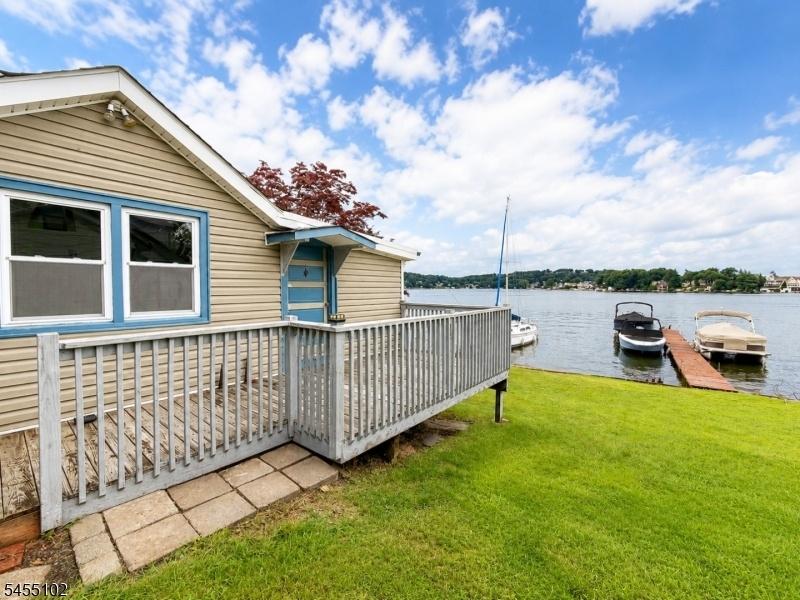 Side view to lake with deck